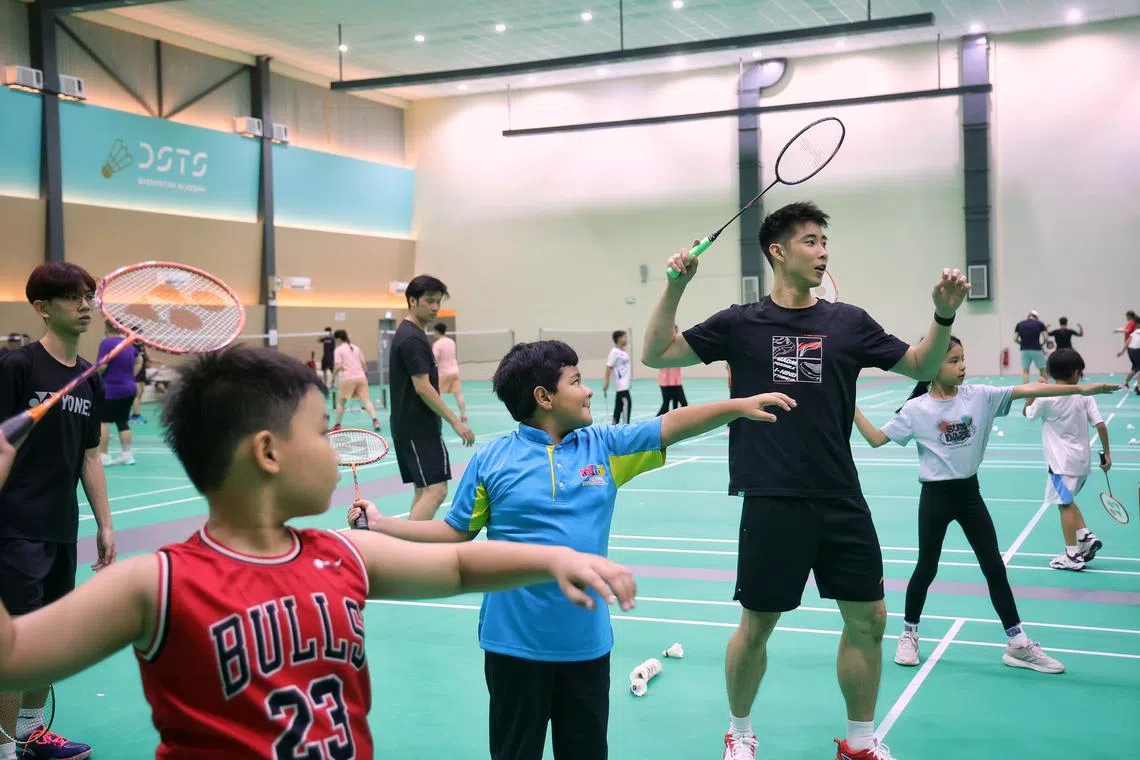 National shuttler Loh Kean Yew at a coaching clinic organised by HSBC Singapore. 