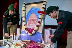 National Cadet Corps cadets light candles to pay their respects to India's late former prime minister Manmohan Singh at Hindu College, Singh's alma mater, in Amritsar.