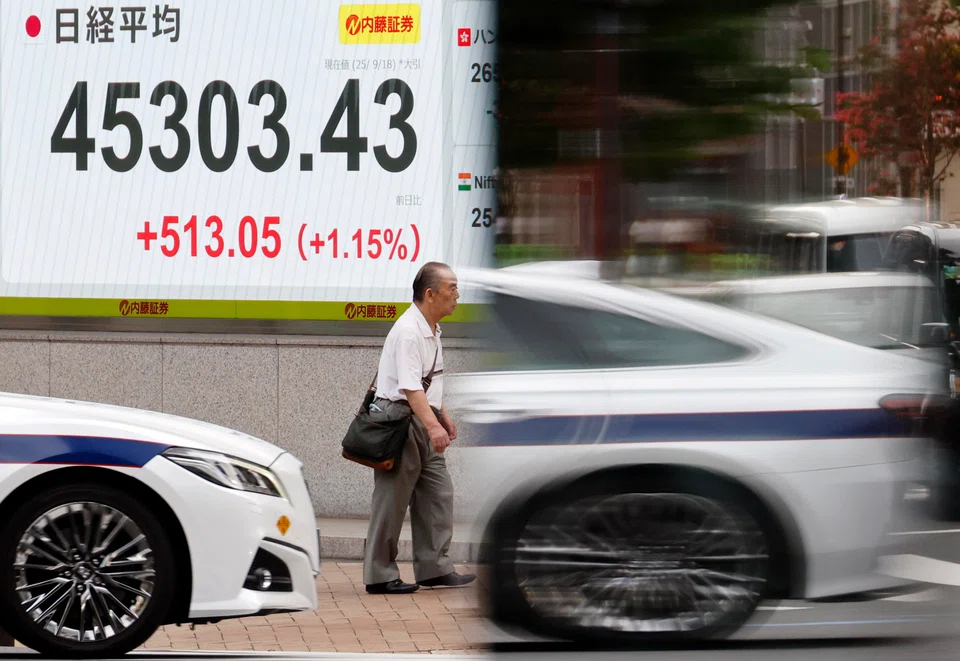 Japan's Nikkei rose with Sydney, Wellington, Manila and Jakarta stocks while Hong Kong and Shanghai shifted between gains and losses.