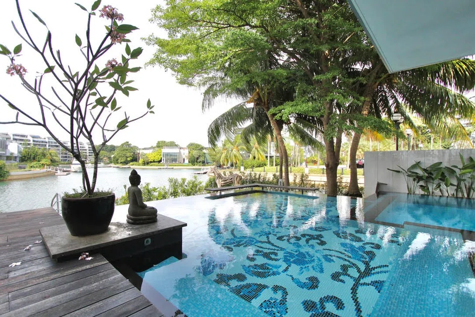 This waterway-facing bungalow along Cove Grove was sold in April this year at S$21 million or S$2,076 psf on its land area of 10,116  sq ft.
