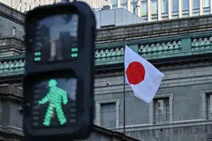 Bank of Japan board member Hajime Takata said the BOJ must keep raising interest rates if companies continue to increase prices, wages and investment.