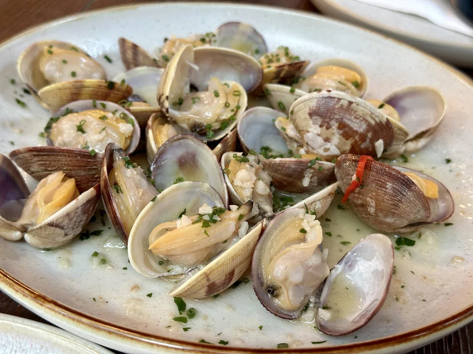 Clams sauteed in olive oil, wine and garlic.