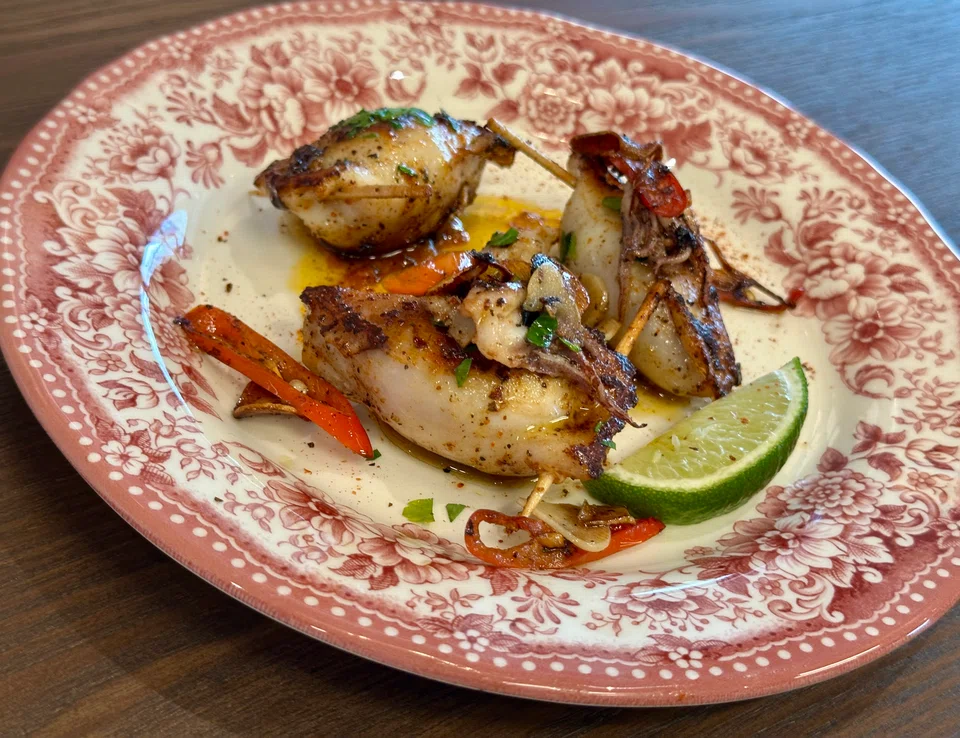 Spicy and smoky mini squids stuffed with chorizo sausage.