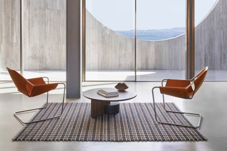 The texture and aroma of traditional Japanese houses’ tatami floors inspires Kuma in the Goz collection of rugs.