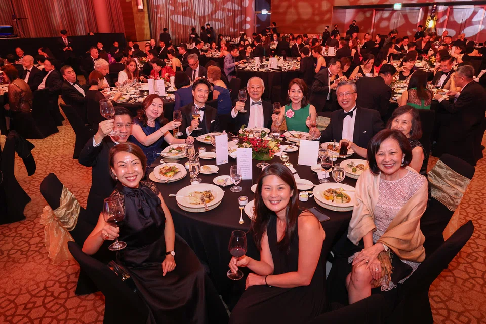 A VIP table at the gala dinner hosted by Lilian Ang, associate editor of The Business Times and Carolyn Choo, vice-president, global multi-national customers, DHL Express. Clockwise from left: Carolyn Choo; Alvin Tay, board member, Mapletree Pan Asia Commercial Trust; Lilian Ang; Kwek Eik Sheng, group chief operating officer, City Developments; Tan Tiong Cheng, independent director, Singapore Land Group; Ng Hsueh Ling, chairman, Lendlease Global Commercial Reit; Choe Peng Sum, CEO, Pan Pacific Hotels Group; Mrs Choe Peng Sum; Pauline Goh, chairman, South East Asia, CBRE; and Quah Ley Hoon, chief people & culture officer, CapitaLand Investment.