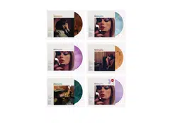 (Clockwise from top left): Six vinyl variants of Taylor Swift's "Midnights" album- mahogany, moonstone blue, blood moon, lavender, jade green and love potion purple. For "Midnights", Swift's last studio album, a total of 35 physical products, including these six vinyl variants, were sold. 