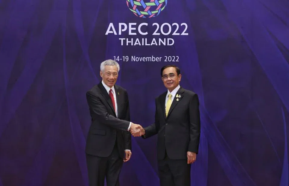Prime Minister Lee Hsien Loong meeting Thai Prime Minister Prayut Chan-o-cha at the 29th Apec Economic Leaders' Meeting in Bangkok on Nov 18, 2022. 