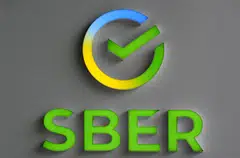 The logo of Russia's state-owned bank. Russia’s largest lender Sberbank has agreed to sell its Kazakh subsidiary to Kazakh state-owned financial holding Baiterek.