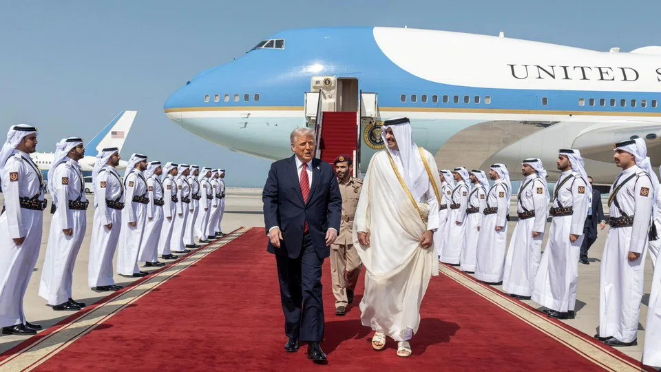 Qatar Emir Sheikh Tamim bin Hamad al-Thani (right) welcoming US President Donald Trump upon his arrival in Doha. Trump says the total investments from the three nations he visited could reach as high as US$4 trillion, in sectors from tech to defence.