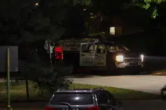 Police from the Allegheny County Police Department guarding the perimeter of the home of the suspected shooter, 20-year-old Thomas Matthew Crooks.