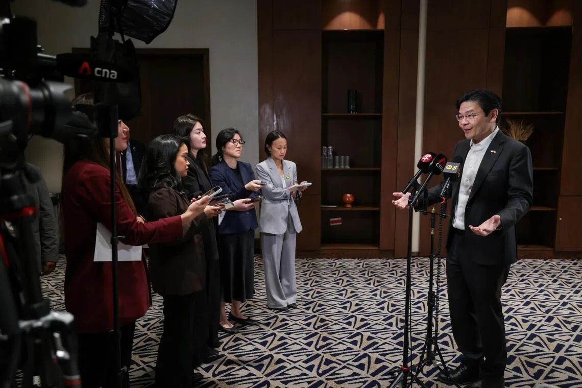 "If America is not involved, or chooses not to be involved, that should not stop the rest of the world from coming together and finding ways on our own to guide the direction forward," PM Wong tells Singapore media as he wraps up his trip.