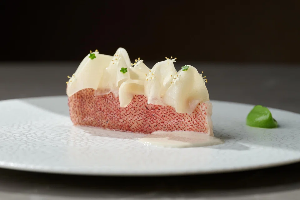 A steamed fish dish with the flavours of chicken rice.