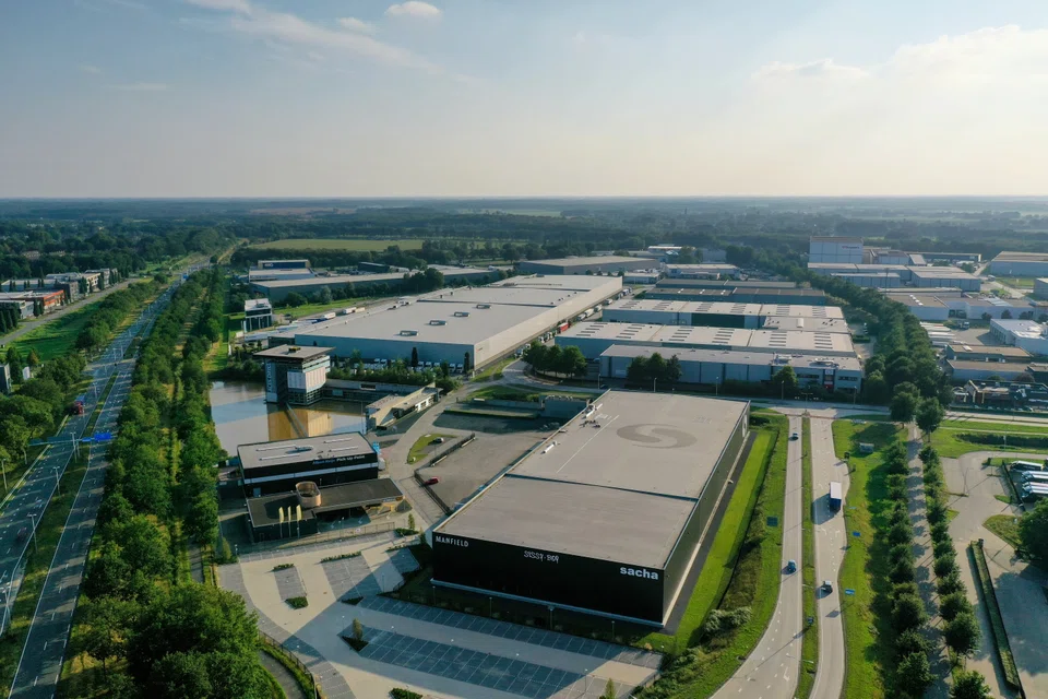 A logistics complex in Tilburg, the Netherlands, that is part of Stoneweg E-Reit's portfolio. The increase in the Reit's second-half portfolio value is mainly a result of lower terminal cap rates, higher passing and market rents.