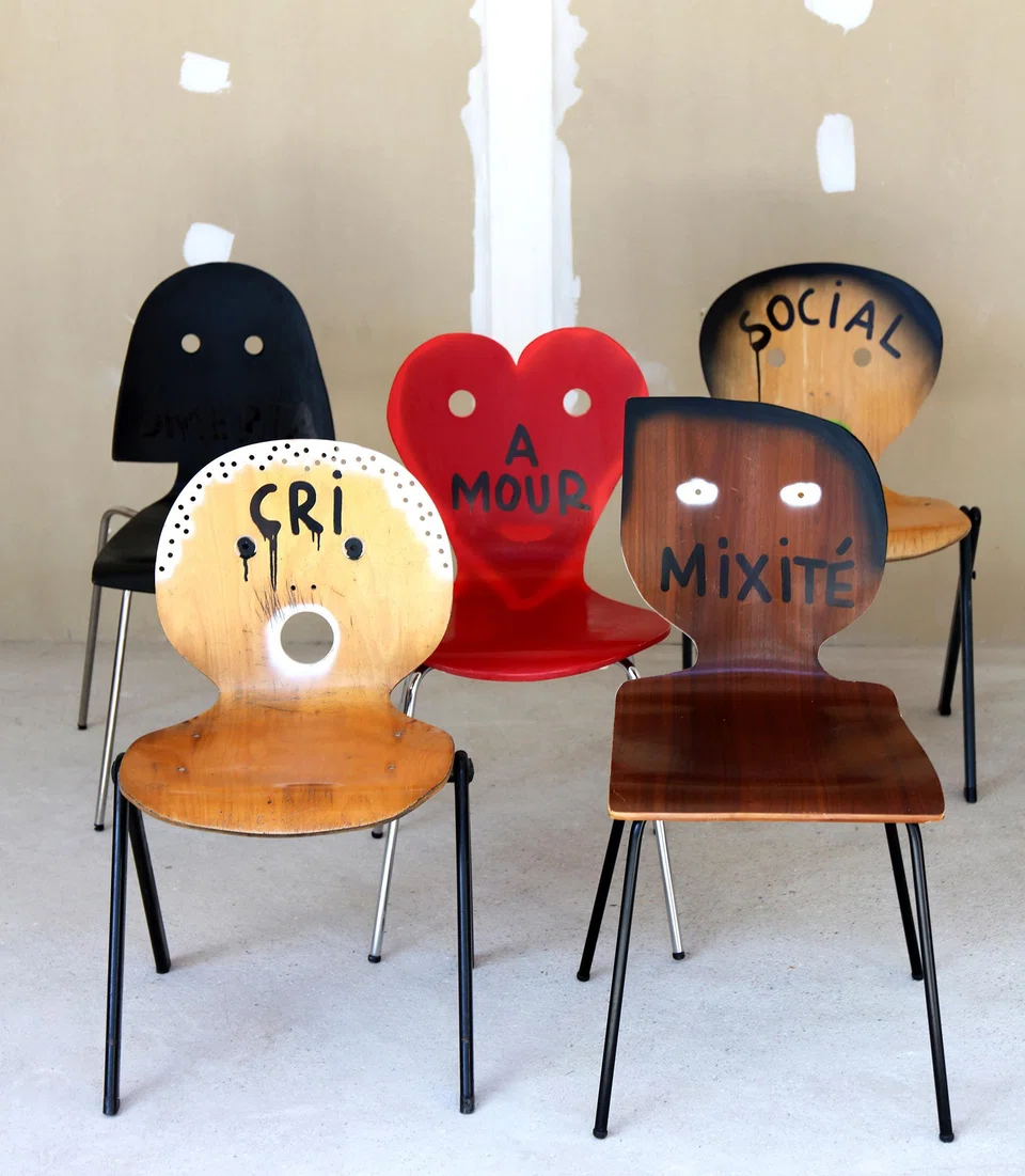 Studio 5.5's display of reused chairs.