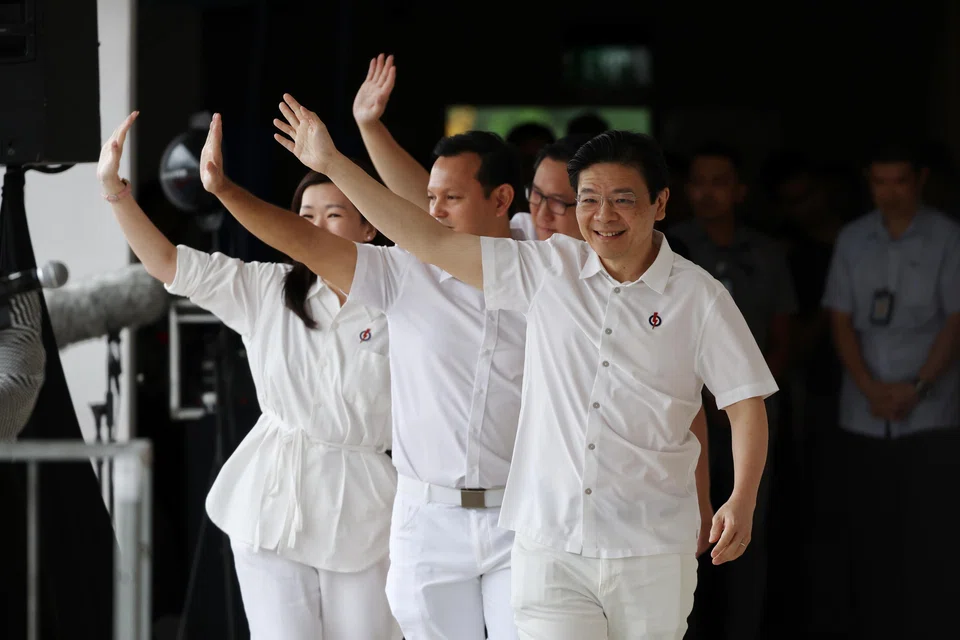 PM Lawrence Wong (front) leads the PAP's team for Marsiling-Yew Tee GRC, which comprises Senior Minister of State for Defence and Manpower Zaqy Mohamad, Alex Yam, and Hany Soh. 