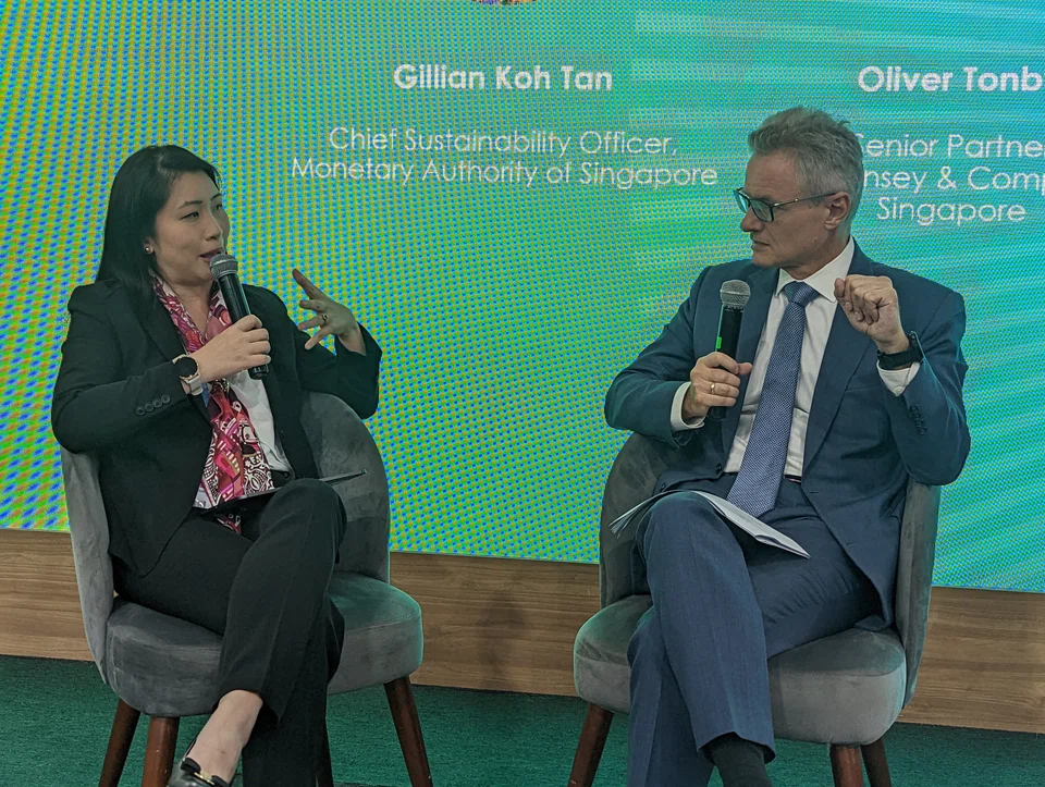 Gillian Tan, MAS' chief sustainability officer, at a fireside chat with Oliver Tonby, senior partner at McKinsey & Company, Singapore, held at the Singapore Pavilion at the 27th United Nations Climate Change Conference. 