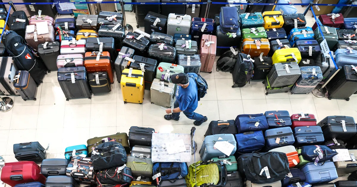 Thai Airways battles 10,000-bag backlog after Bangkok floods - The Business Times