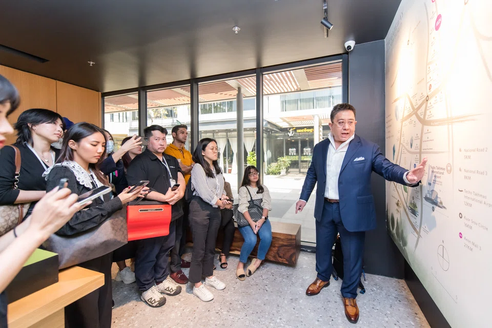 Ng Aung San, founder and co-CEO of Sir Stamford Raffles Group, shows journalists the proximity between his firm's flagship township Marum Estate and Cambodia's Techo Takhmao International Airport, which is set to open in 2025.