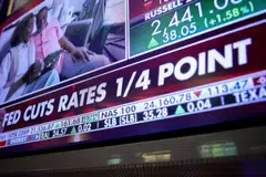 US stocks were choppy after the Federal Reserve's decision, with the Dow Jones Industrial Average ending up 0.6 per cent at 46,018.32.