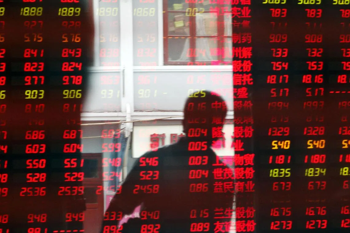 A sea of red on an electronic stock board in Shanghai during the 2008 great financial crisis. As geopolitical stresses mount, we should both re-remember the past and try to imagine what might happen in the future if a financial crisis erupted in China, for example, amid deep conflict.