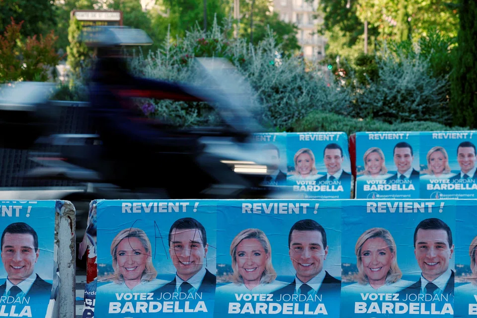 National Rally's election posters in Paris. A key question is not whether the far-right party will win the most votes in the French national election, but whether it will secure an overall majority. 