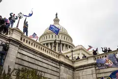 Supporters of former President Donald Trump climb the walls of the US Capitol in Washington, United States, Jan 6, 2021. US District Judge Timothy Kelly sentenced Michael Sparks, the first rioter to enter the US Capitol that day, to 53 months in prison and a US$2,000 fine.