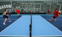 Diane and Phil Schiavo play pickleball against Lori Vickery and Frank Laratonda during the 2023 Ballpark Series at Fenway Park, home of Major League Baseball’s Boston Red Sox, in Boston, Massachusetts, US, July 14, 2023.     