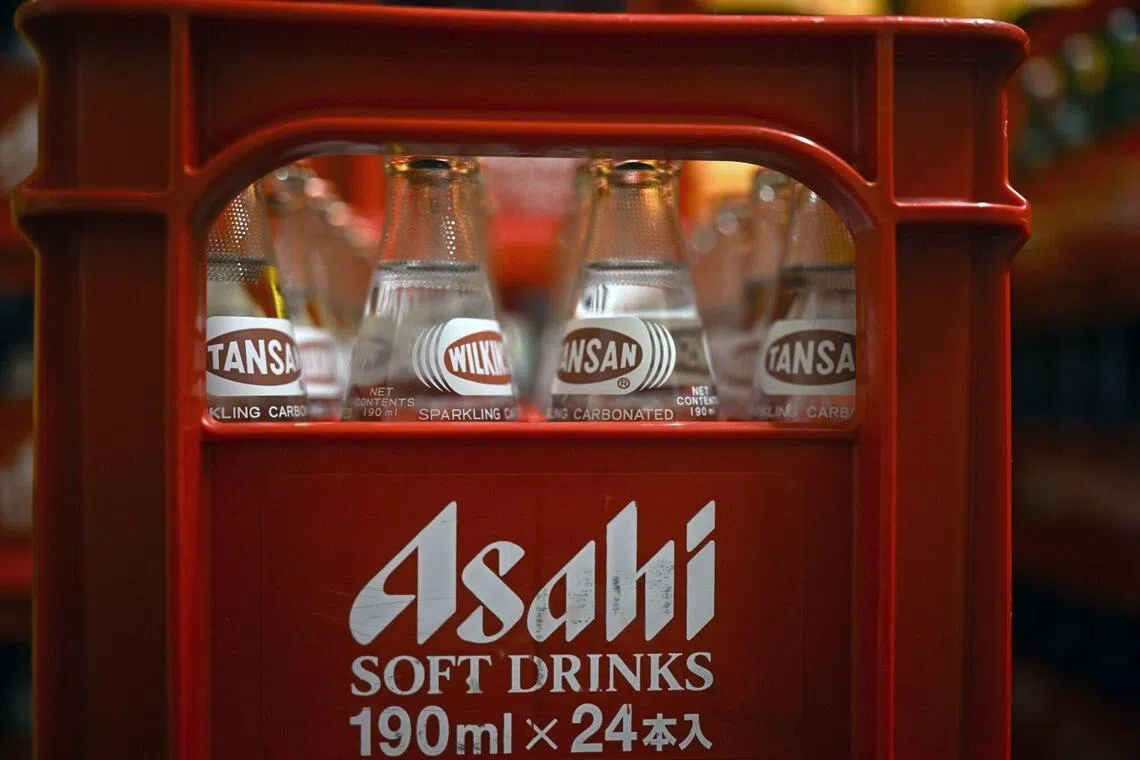 Asahi halted production at most of its 30 factories in Japan after a cyberattack hobbled its ordering and delivery system. 