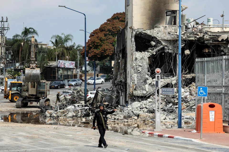 Oil prices spiked on Monday (Oct 9), following news of a surprise attack on Israel by Palestinian militant group Hamas. Above: A police station, the site of a battle following an infiltration by Hamas gunmen in southern Israel on Sunday (Oct 8). 