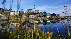 The island, whose capital Nuuk (top) is closer to New York than the Danish capital Copenhagen, boasts mineral, oil and natural gas wealth.