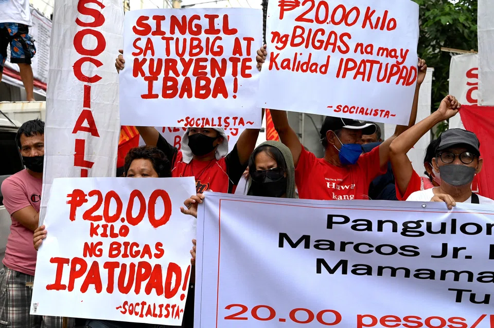 Protesters staging a rally  in Manila to urge new Philippine President Ferdinand Marcos Jr to bring down the price of rice. 