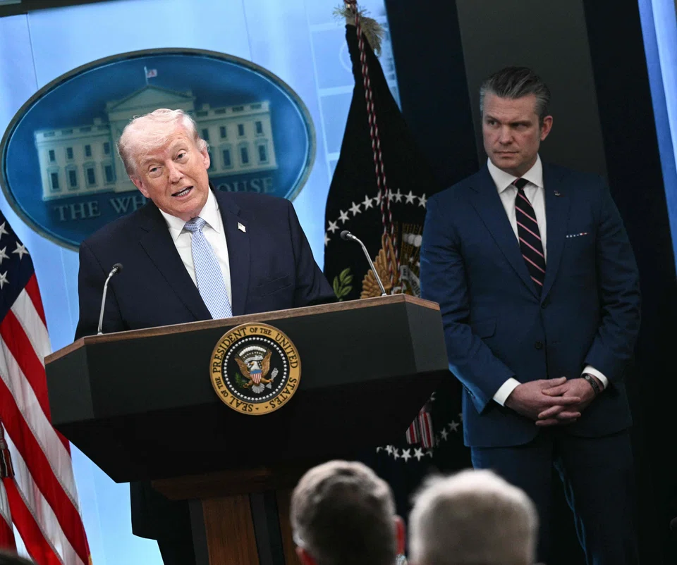 US President Donald Trump (left), Pentagon chief Pete Hegseth (centre) and chairman of the Joint Chiefs of Staff General Dan Caine (right) at a news conference at the White House on Monday (Apr 6).