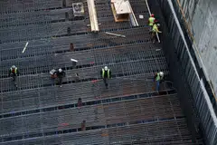 The stronger construction numbers suggest that builders were growing more confident at year’s end even as they continued to sell off a bloated inventory of new houses.