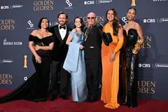 (From left) Adriana Paz, Edgar Ramirez, Selena Gomez, Jacques Audiard, Karla Sofia Gascon and Zoe Saldana pose with the Best Motion Picture - Musical or Comedy award for "Emilia Perez" in Beverly Hills, California, Jan 5, 2025. 