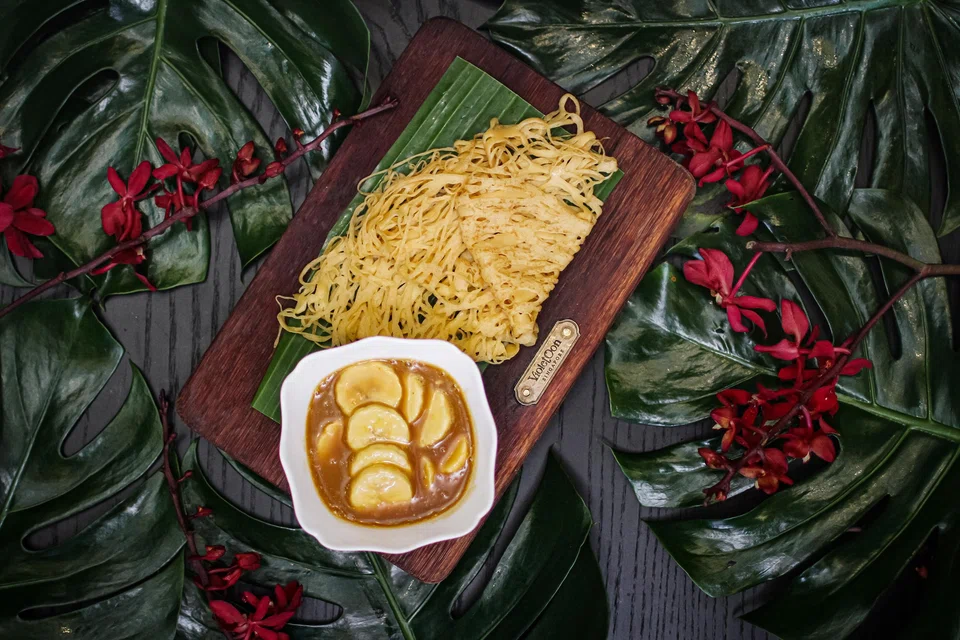 Roti jala with banana pengat.
