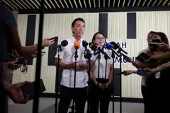 Acting Transport Minister Jeffrey Siow and fellow Chua Chu Kang GRC MP Choo Pei Ling speaking to the media at a community event at Tengah Community Club on June 8.