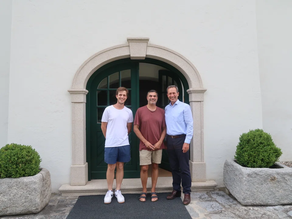 Desai at the top-tier Weingut Prager in Austria, with the winemaker and his son.