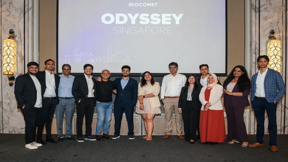 GoComet team at Odyssey Singapore 2025.