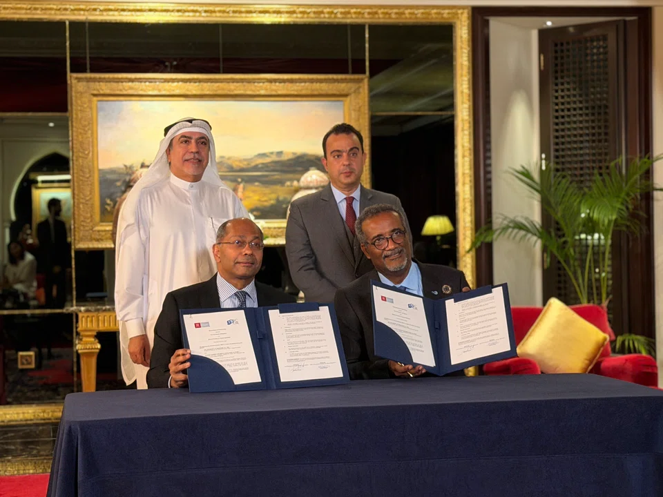 Seated, from left: Samuel Chacko of LawSoc and Ahmed Husain, CEO of BCDR. Standing behind them, from left, are Salah Ahmed Almedfa, president of the Bahrain Bar Society, and Ali Abdullah Al Aradi, chairperson of BCDR’s board of trustees.