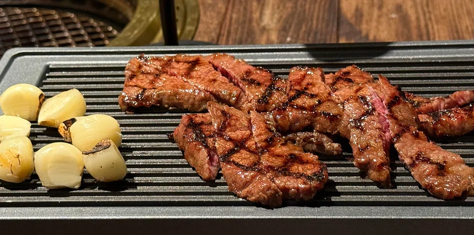 The marinated short rib and whole garlic.