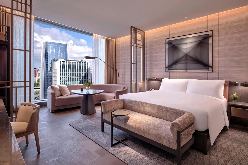 Rooms look out to a bird's eye view of Qianhai Bay.