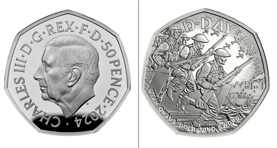 The coin depicts Allied soldiers disembarking onto a beach in Normandy as war planes fly above. The portrait of Britain’s King Charles is on the other side.