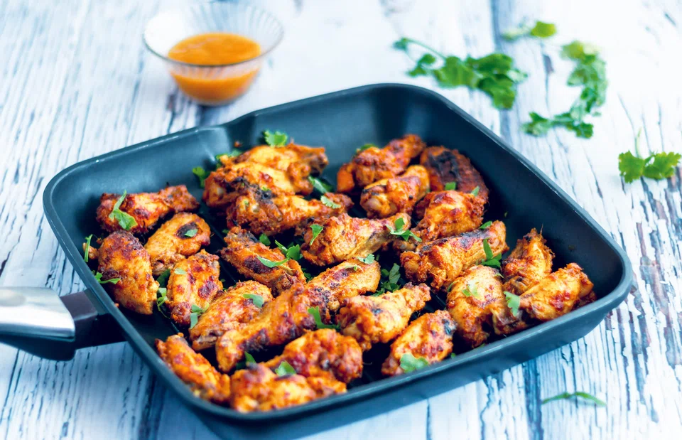 Cooking chicken wings is tricky. The drumette and the wingette may cook unevenly. Getting the skin crispy is a skill; leaving it flabby — a crime.