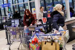 Reflecting worries about inflation, more than half of the people surveyed by Barclays said they planned to reduce spending on food and discretionary items this year.