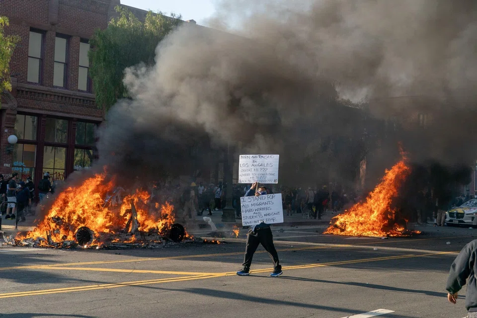 The turmoil comes as Los Angeles saw a fourth night of clashes between police and demonstrators rallying against a rising number of raids by Immigration and Customs Enforcement agents.