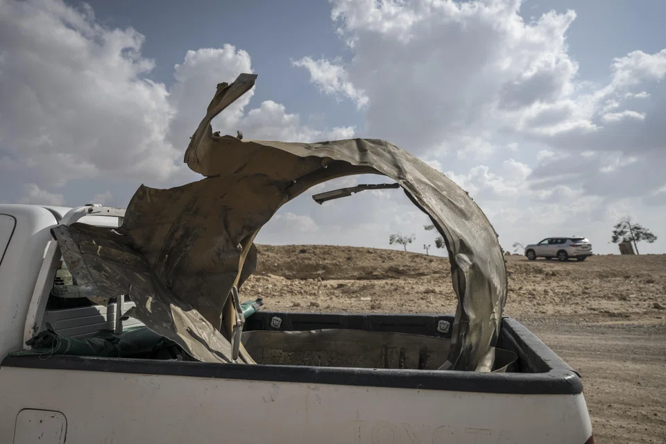 Pieces of an Iranian missile in a pickup truck outside Arad, Israel, on Apr 14.  The previous day, Iran had launched a retaliatory missile and drone attack on Israel. Most of the missiles and drones were intercepted. 