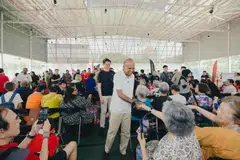 Minister for Home Affairs and Law K Shanmugam interacting with beneficiaries at the 38th edition of the DBS Foundation Community Pop-Up Market on Mar 29. 