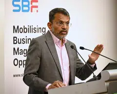 The world is moving towards a "climate-impaired" and "carbon-constrained" future, notes Ravi Menon. 