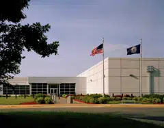 The building is a one-storey data centre facility east of Linton Hall, in a transition area between heavy industrial uses to the east and residential development to the west. 