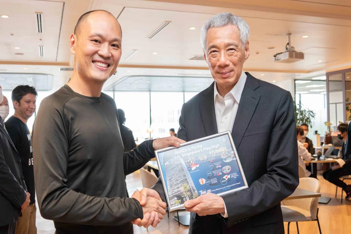JustCo CEO Kong Wan Sing (left) hosted Singapore Prime Minister Lee Hsien Loong at the company's new centre in Tokyo, located at Shibuya Hikarie building.